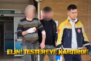 Elini testereye kaptırdı!