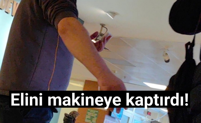 Elini makineye kaptırdı!