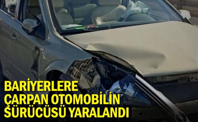 Bariyerlere çarpan otomobilin sürücüsü yaralandı