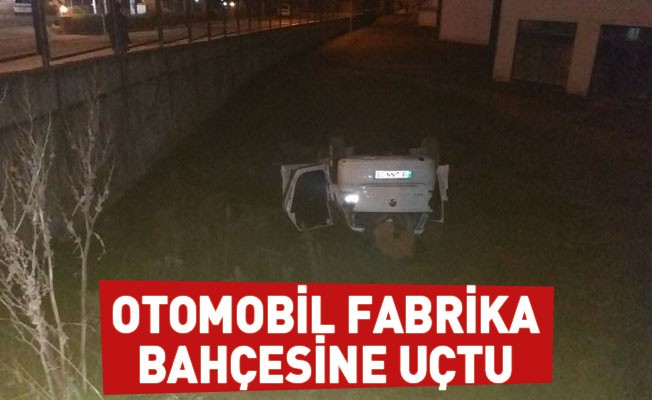 Otomobil fabrika bahçesine uçtu