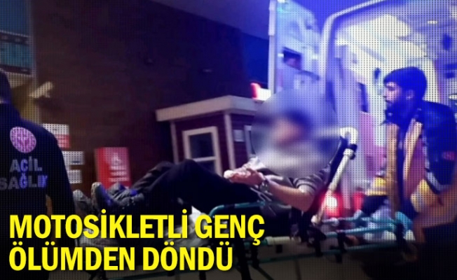 Motosikletli genç ölümden döndü