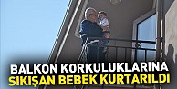 Balkon korkuluklarına sıkışan bebek kurtarıldı