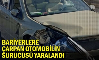 Bariyerlere çarpan otomobilin sürücüsü yaralandı