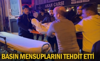 Basın mensuplarını tehdit etti