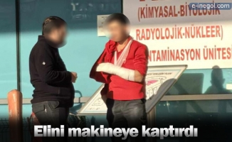 Elini makineye kaptırdı