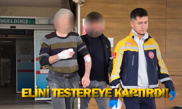 Elini testereye kaptırdı!